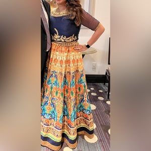 Gorgeous printed lengha. Blouse has sheer sleeves.REDUCED ! Make offer